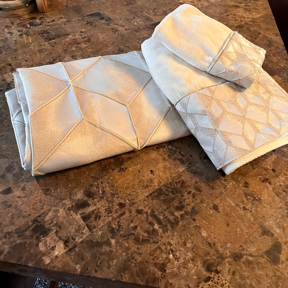 Used bath curtain with matching body and hand towel.